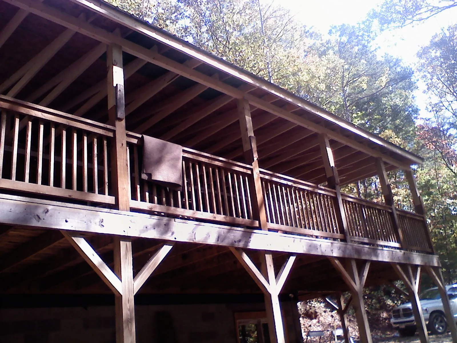 Timber framing under a new elevated porch and deck — Roof Leak Repair in Kings Park by Roofing Brothers